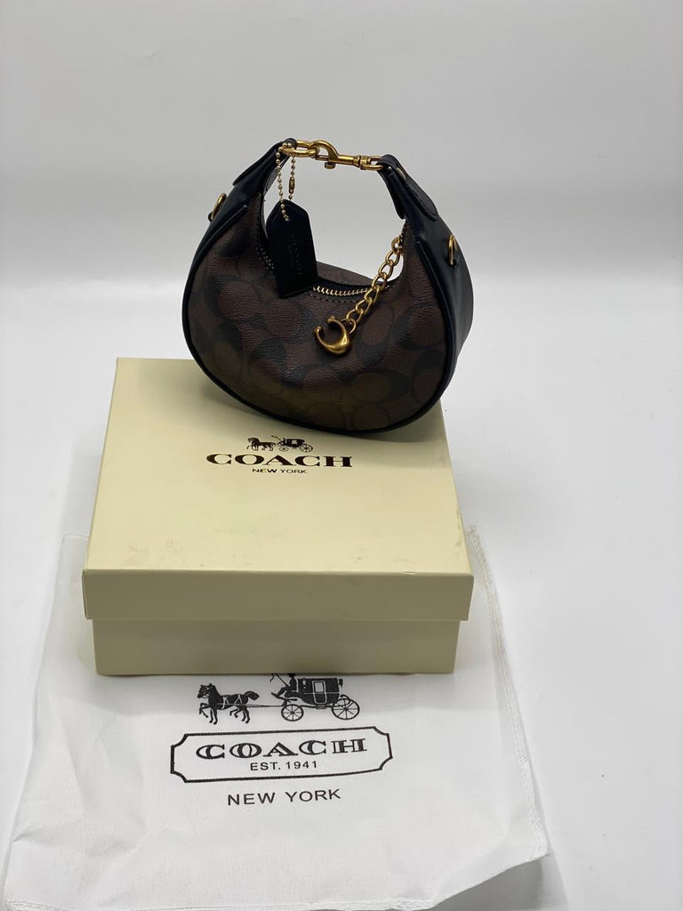 Coach Jonie with Brand Box